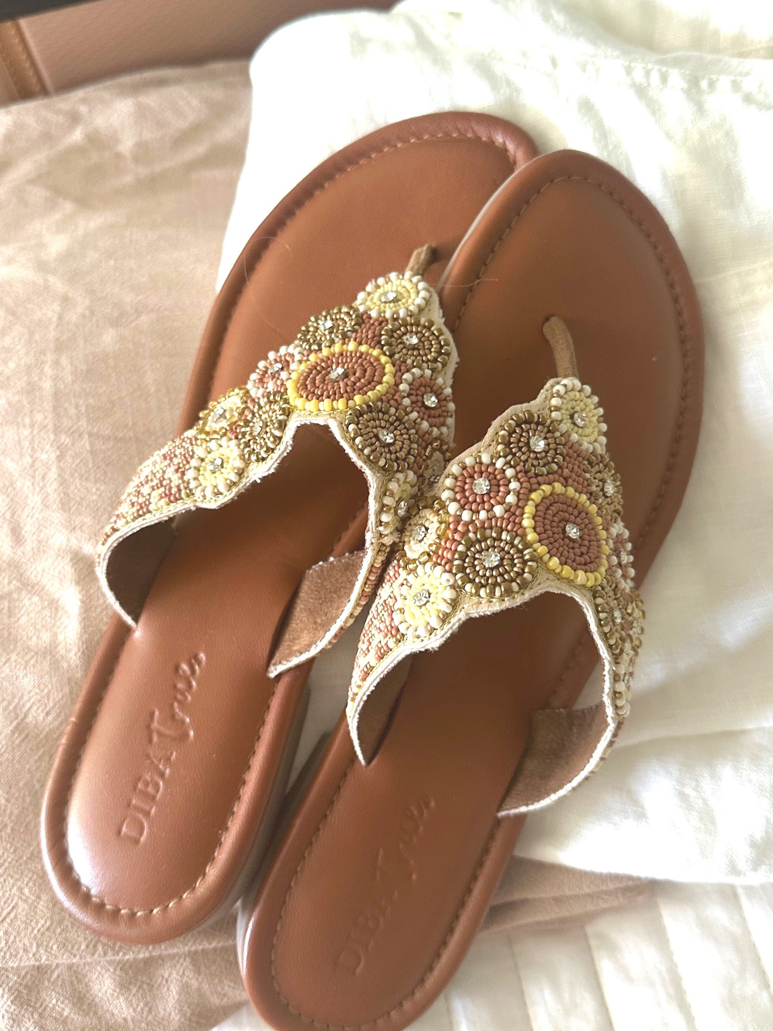These sandals are giving me all the summer vacation vibes! ☀️✨

I just added these beautiful beaded sandals from Soft Surroundings to my warm-weather wardrobe, and I couldn’t love them more. The artisan-inspired glass beadwork adds the prettiest touch, while the cushioned footbed keeps them comfortable enough for all-day wear. From flowy dresses to cropped pants and shorts, they’re the kind of shoe that instantly makes an outfit feel a little more special.

And can we talk about these gorgeous neutral colors? They’ll go with practically everything in my suitcase for Italy! 🇮🇹

Would you wear beaded sandals like these, or are you more of a classic flip-flop gal? 💕

#SoftSurroundings #SummerStyleOver50 #FashionOver50 #ComfortableStyle #SandalSeason