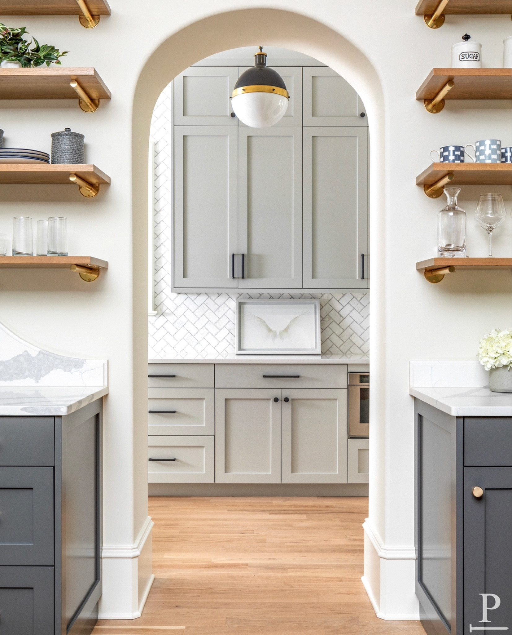 A quick look into our scullery at 308 Wonderwood with modern light fixtures and arches hallways! 



#LTKhome