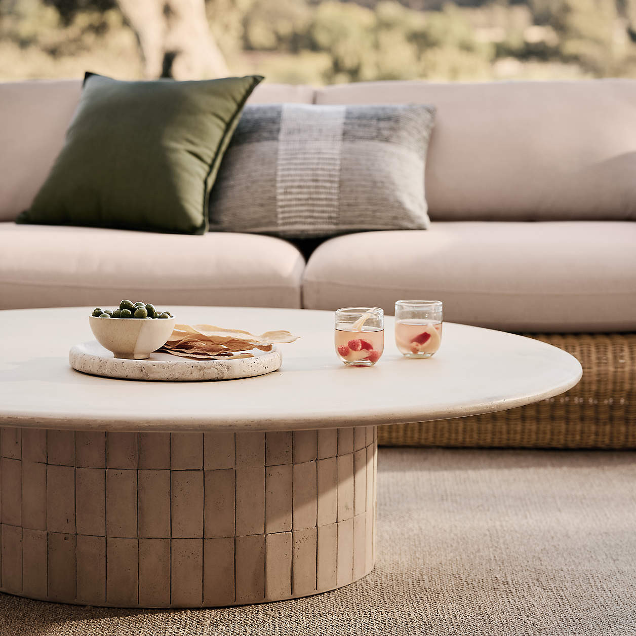 Ipanema Tile and Resin 54" Round Outdoor Coffee Table + Reviews | Crate & Barrel | Crate & Barrel