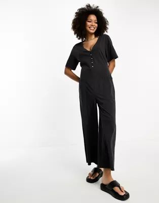 ASOS DESIGN jersey button front chuck on jumpsuit in washed black | ASOS (Global)