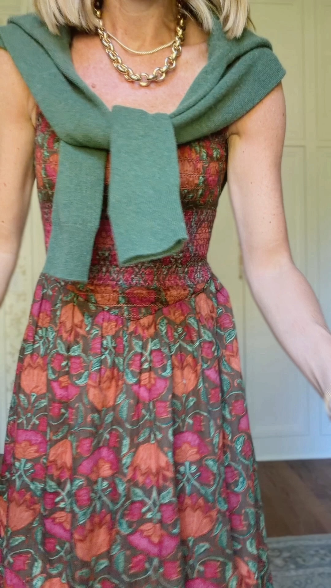 Xs in dress and sweater