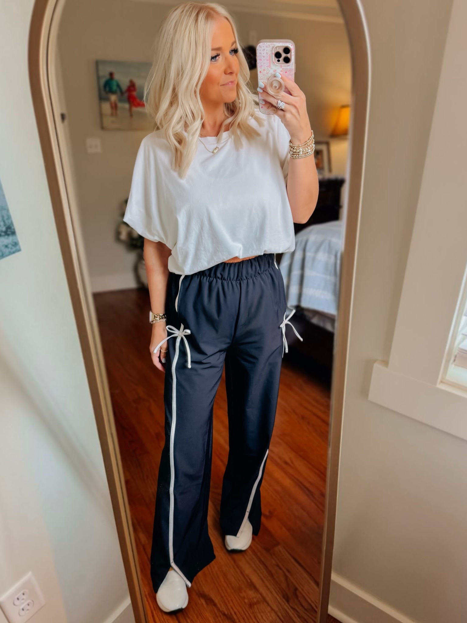 the cutest bow track pants, & on sale! 🤍🎯 wearing size S. 

#LTKSaleAlert #LTKootd #LTKmomlife