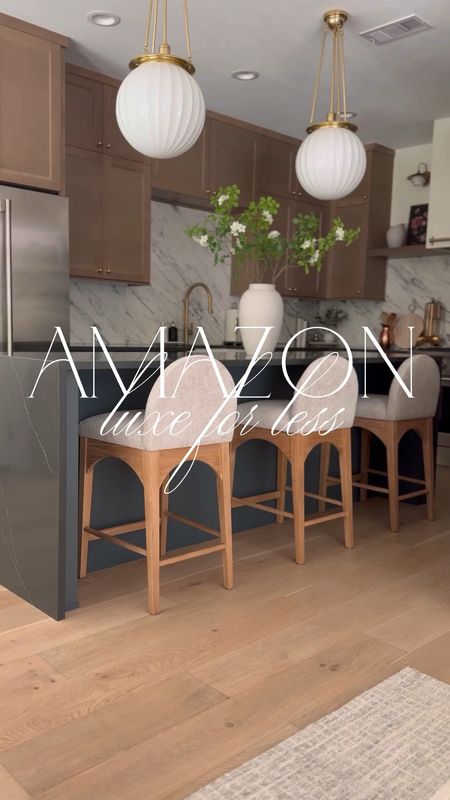 New Amazon counter stools in our kitchen! This is the Grey, but they come in a number of fabric colors and finishes! These are a beautiful chenille fabric and quality is fabulous! Super simple assembly as well. Love the arch detail!

#LTKStyleTip #LTKVideo #LTKHome
