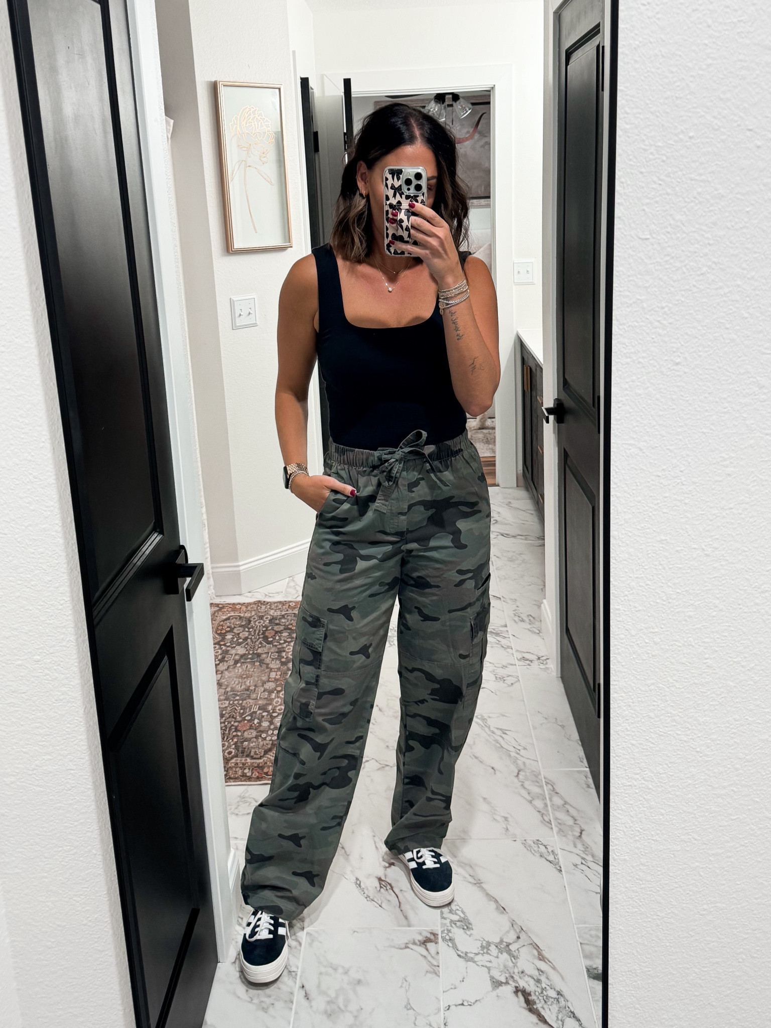 Tank-medium
Camo Cargo Pants-small tall
Sneakers-size down 1/2 size 

#LTKSaleAlert #LTKShoeCrush #LTKStyleTip