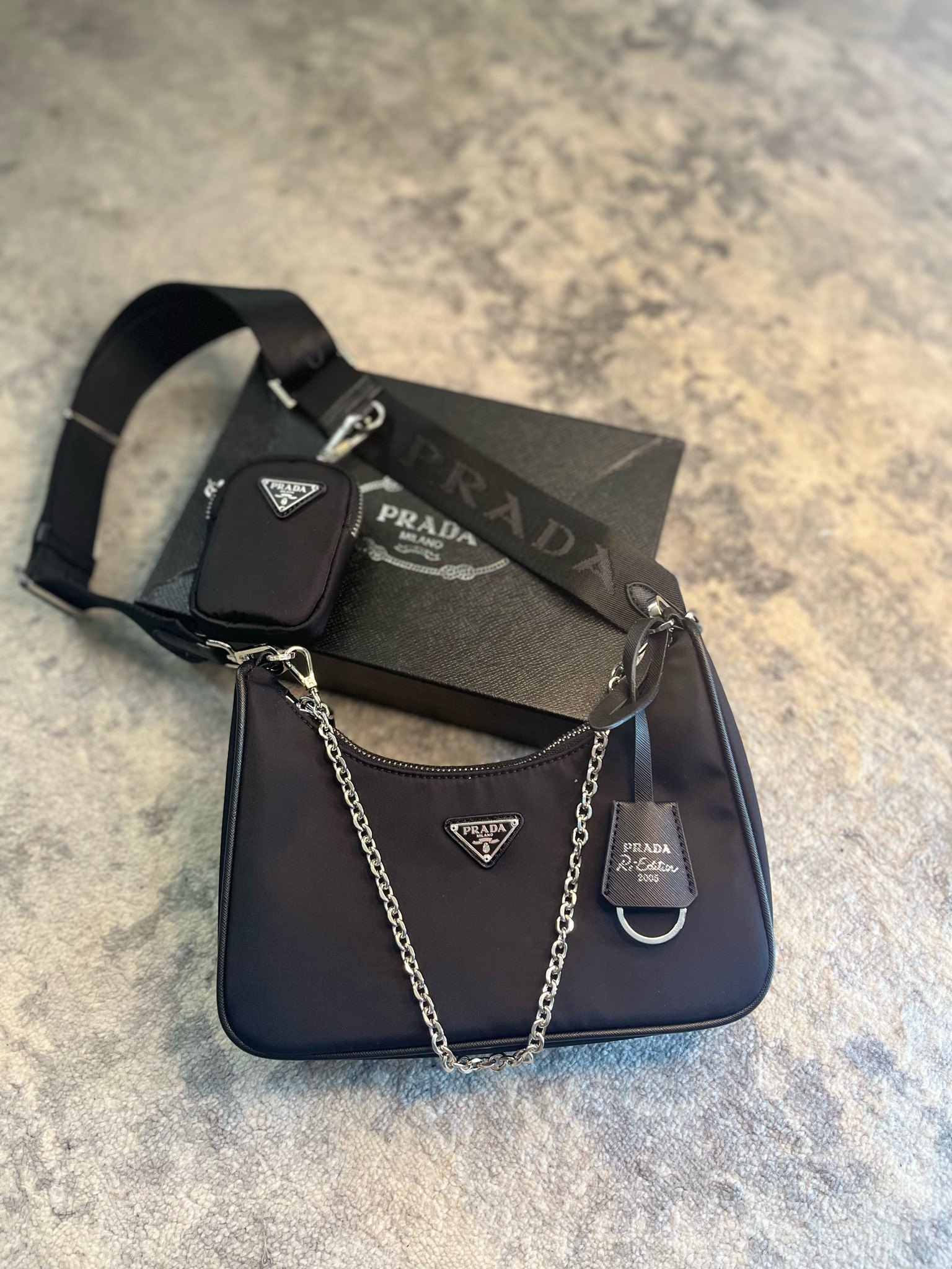 This prada nylon bag for less than $20, the original is over $1,200 !!! This is the perfect purse for everyday use and is so cute! Pairs well with every outfit #fashion #style #affordablefashion #prada #pradanylon #purse #handbag #designer #luxurylife #dhgate #thefence #boujeeonabudget

#LTKfindsunder50 #LTKitbag #LTKstyletip