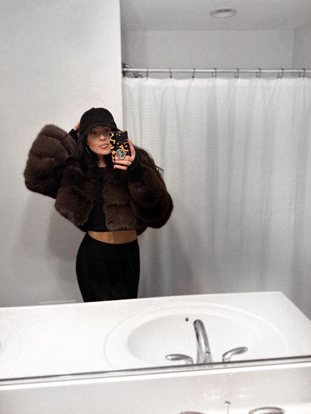 The brown is sold out, but obsessing over this cropped faux fur coat from Amazon! I ordered a medium and it fits great. Also wearing  satin lined hat from Amazon as well 

Faux fur coat, faux fur, winter fashion 

#LTKfindsunder100 #LTKstyletip