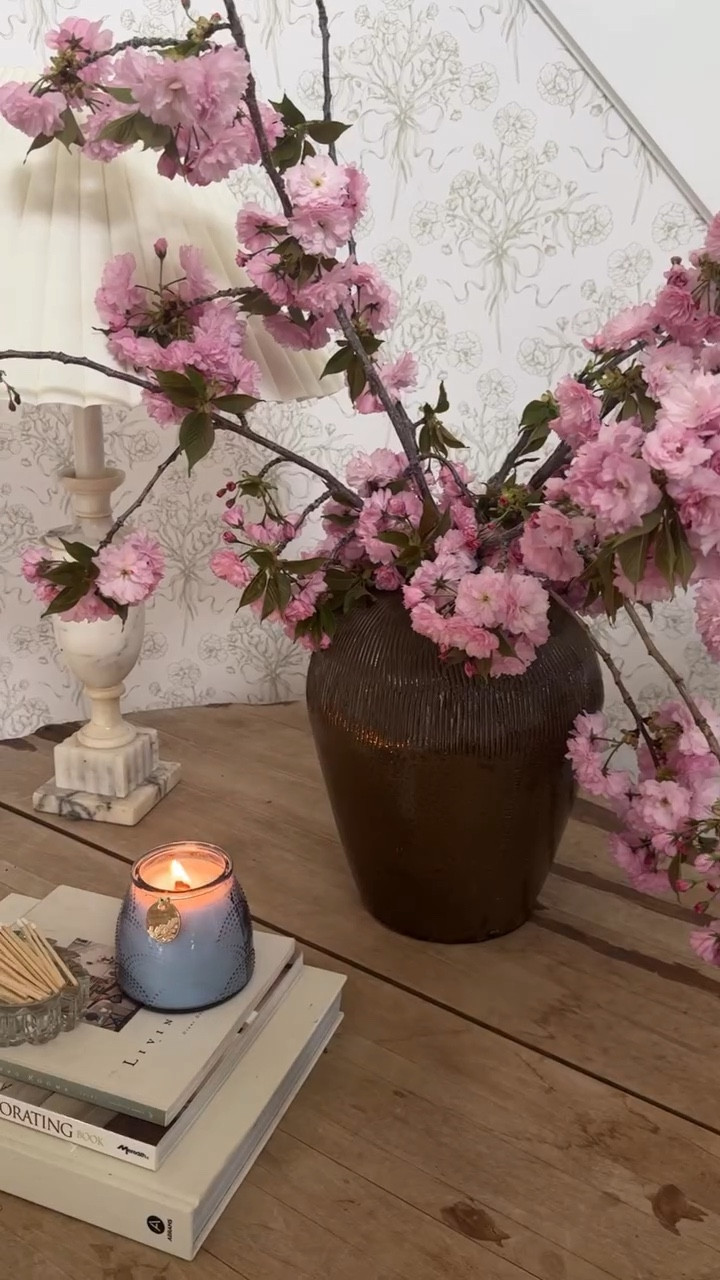 This is your sign to bring the outside in 😍 our tree in the front yard was in need of a little trim and lucky for me, the blooms were so stunning that I got to add them to my entryway console table! Utah is blooming everywhere you look right now and is so stunning! Has spring sprung where you live? Follow along @ourmountainsidehome_1 if you love classic transitional home style!  Spring, spring blooms, spring florals, entryway decor, console table, vintage style, collected home, FBMP finds, two story entry, free decor, home decor on a budget, Nancy Meyers home aesthetic, classic home style.  #spring #springdecor #consoletable #entrywaydecor #nancymeyersinteriors