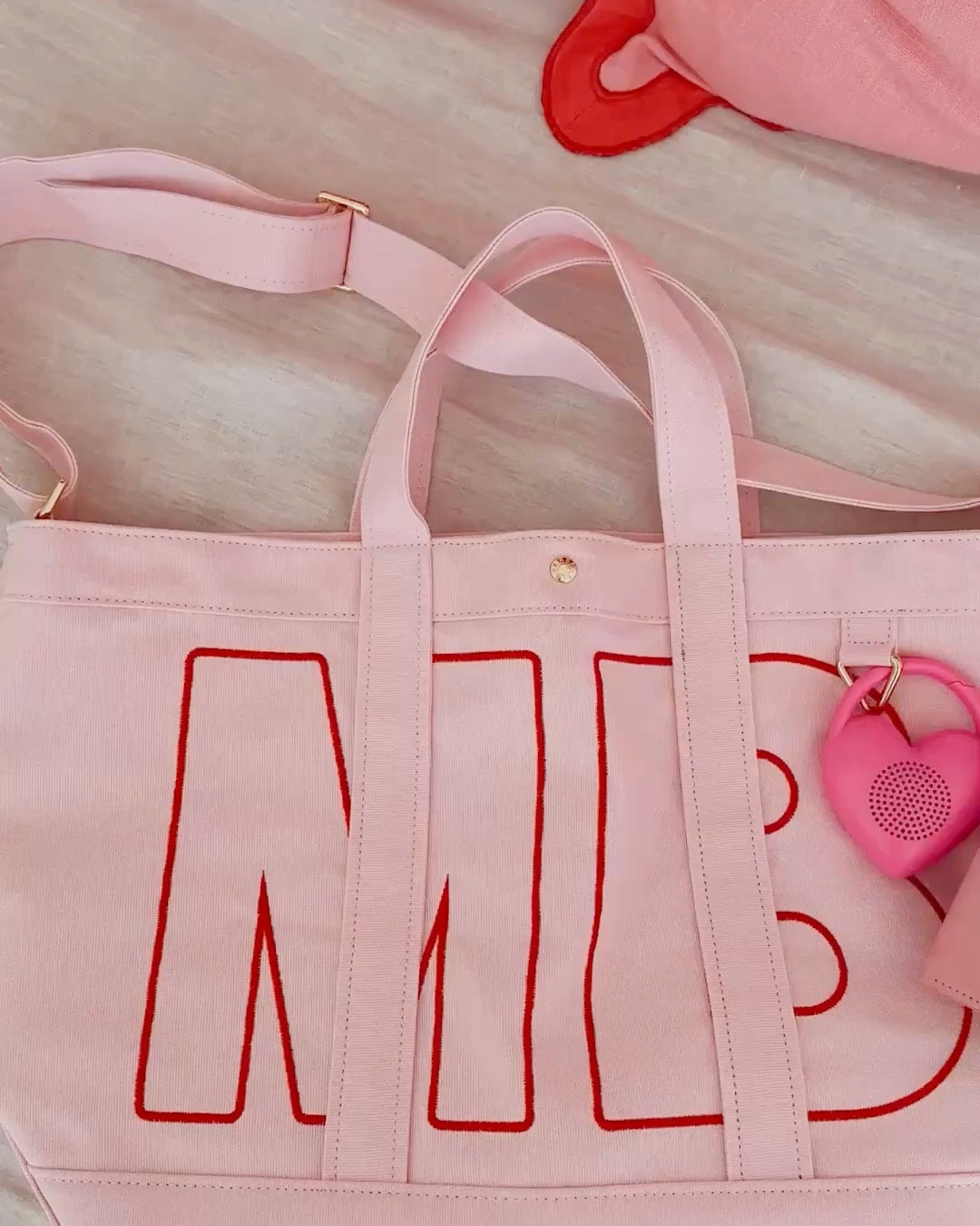 Travel essentials but make them cute 💕✈️ This little tote fits everything I need, and honestly everything pink and red just makes traveling feel happier and easier. If my bag looks this good, I’m already in a better mood before I even leave.

#LTKSeasonal #LTKTravel #LTKFindsUnder100