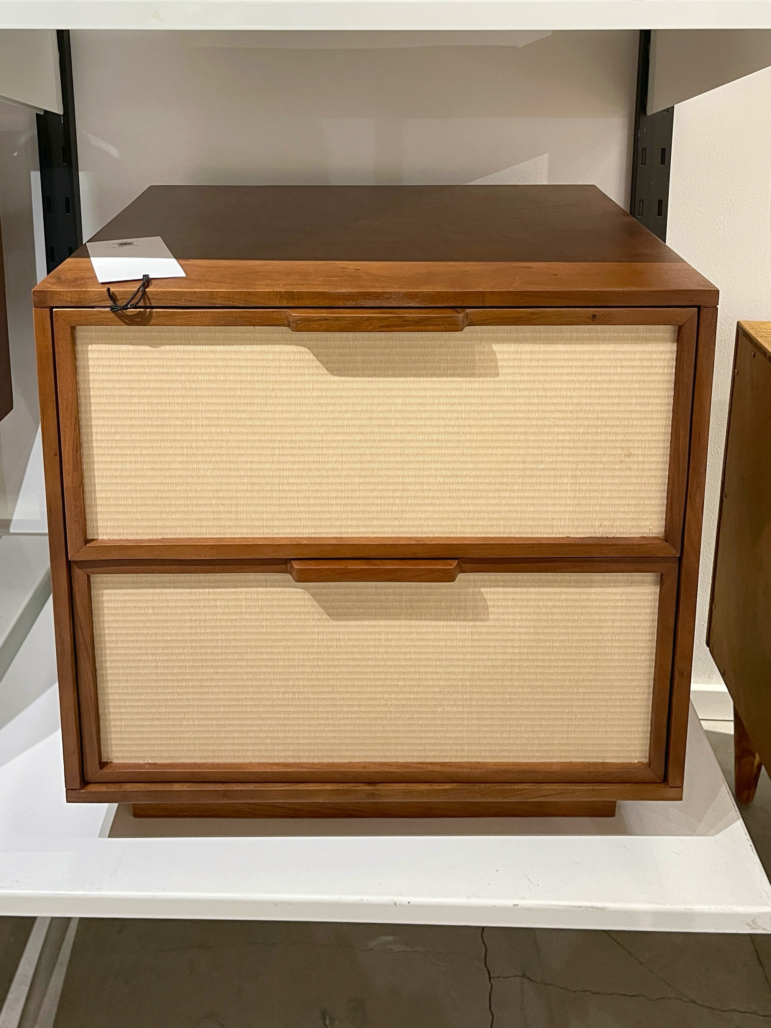 Finely woven tatami brings simple elegance to this nightstand.  The clean geometric frame with minimalist integrated handles adds a modern touch, while the Japanese tatami texture brings a refined, natural look to your space. With two roomy drawers, it’s the perfect blend of style and functionality.

#LTKHome #LTKSaleAlert