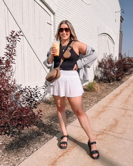 Summer ootd - white tennis skirt with built in shorts, my fave basic black tank, waffle button up shirt 

2023 fashion trends, affordable fashion, midsize outfit ideas


#LTKSeasonal #LTKstyletip #LTKFind