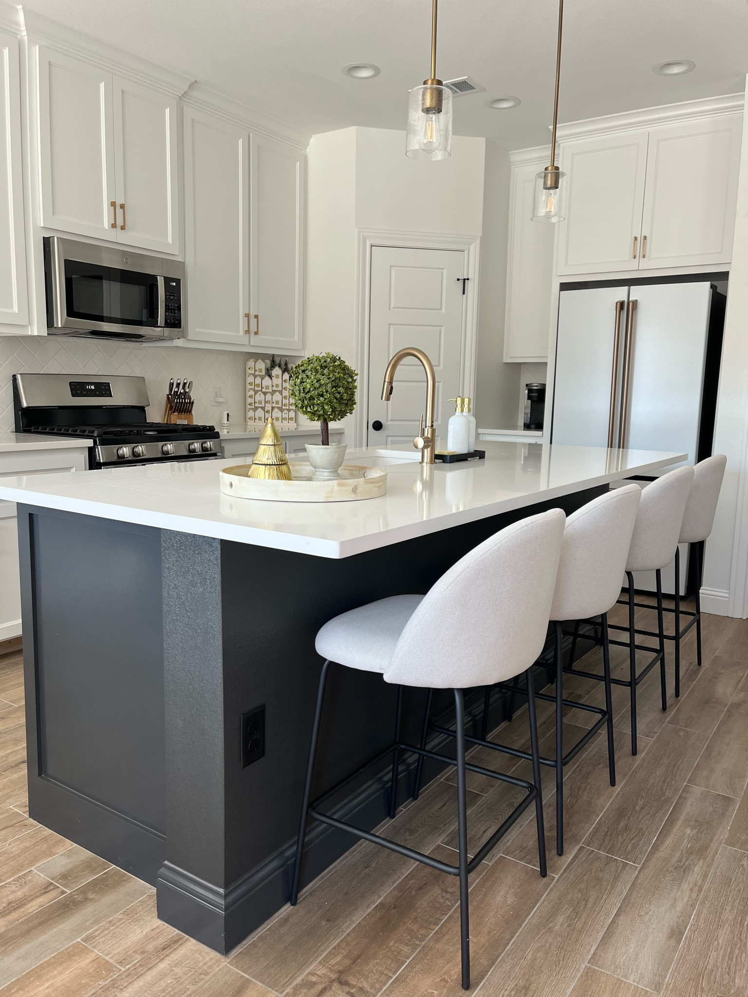 Finally got our kitchen all settled after moving. Absolutely obsessed with our barstools and new fridge! 


#LTKhome #LTKFind #LTKfamily
