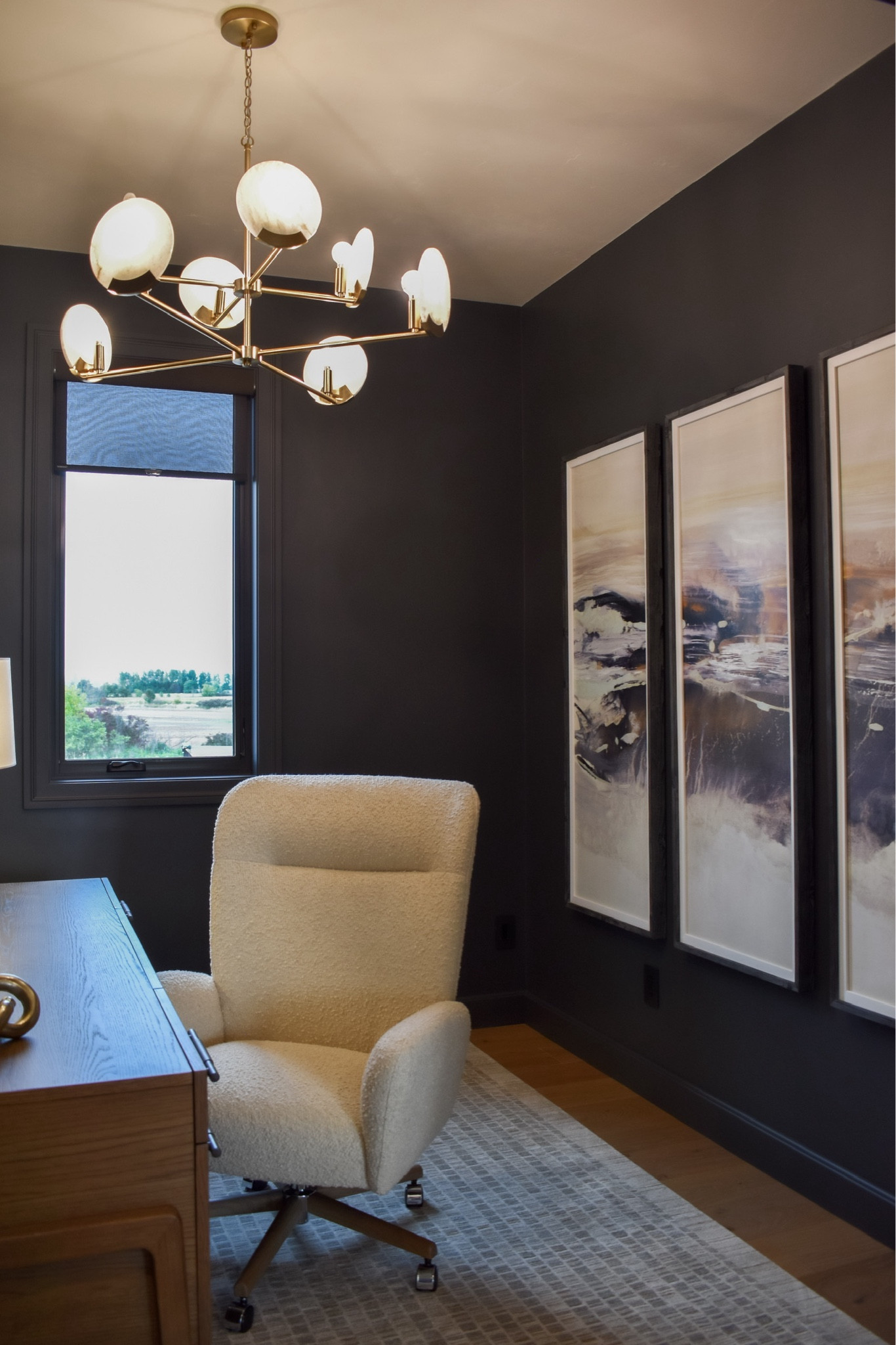 A dark-toned office exudes professionalism with its sleek furnishings, subtle lighting, and a refined layout.

#homedecor #homedesign #homeoffice #interiordesign 

 #LTKHome
