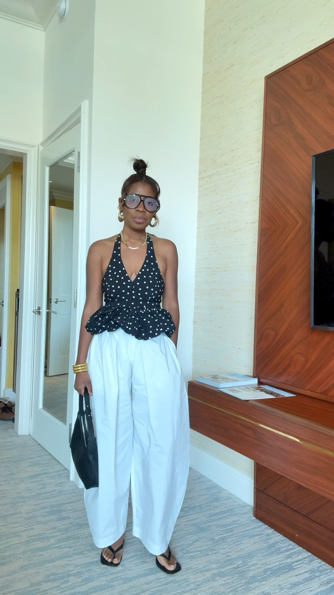 Polka dot peplum top with halter top and white barrel leg pants. What I wore to brunch in LA. @Urban Revivo 

#LTKootd #LTKdayinmylife #LTKgrwm