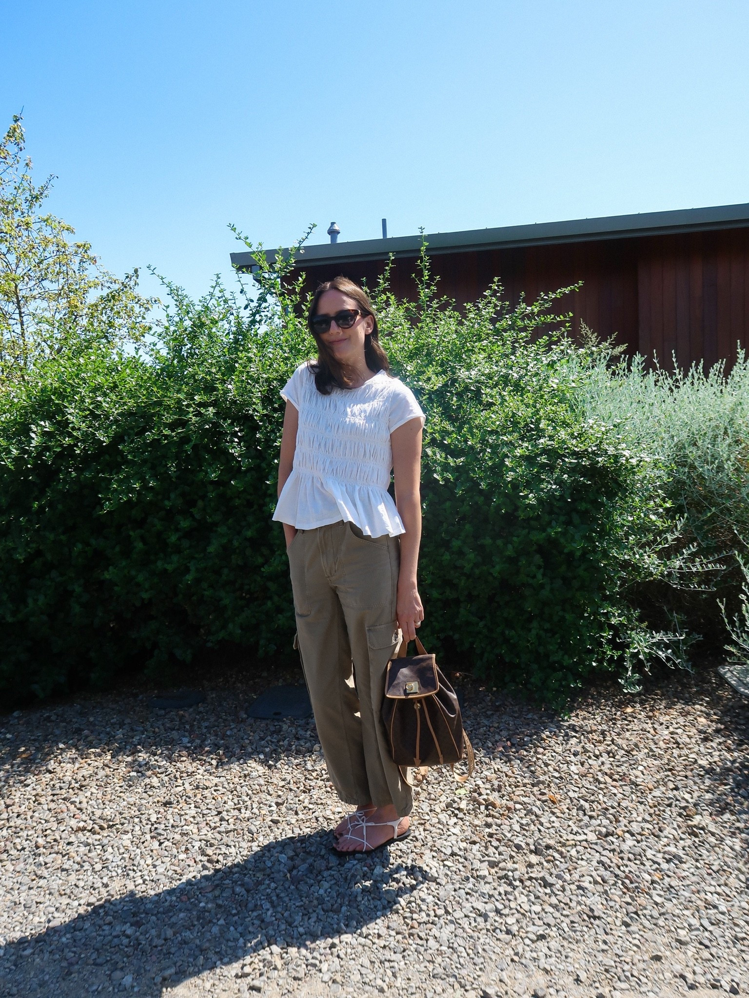 Casual summer outfit in Anthropologie smocked tee, citizens utility pants (took my smaller size) and the easiest white strappy sandals. 🤍

#LTKdayinmylife #LTKootd #LTKSaleAlert