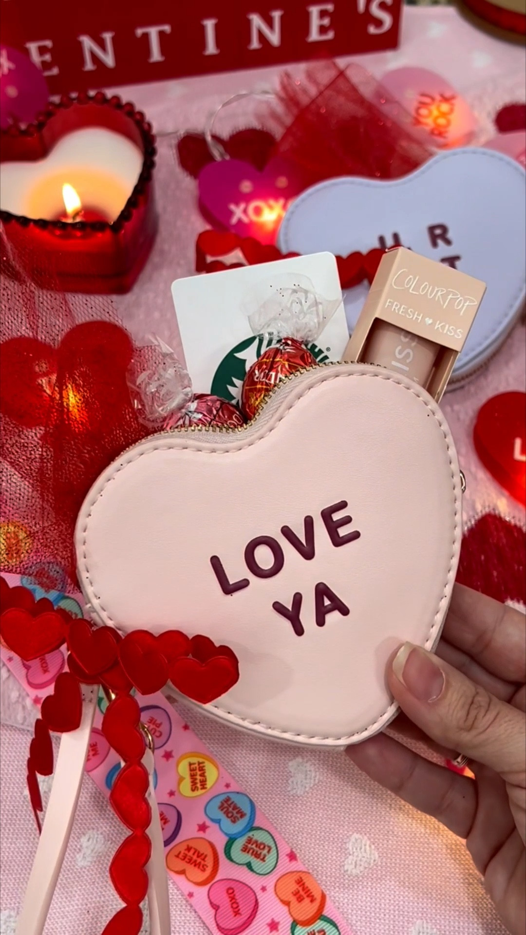 The cutest valentines gift. There’s little wristlets are the absolute cutest! Perfect for a Galentine’s gift. Conversation heart bag. 

#LTKSeasonal