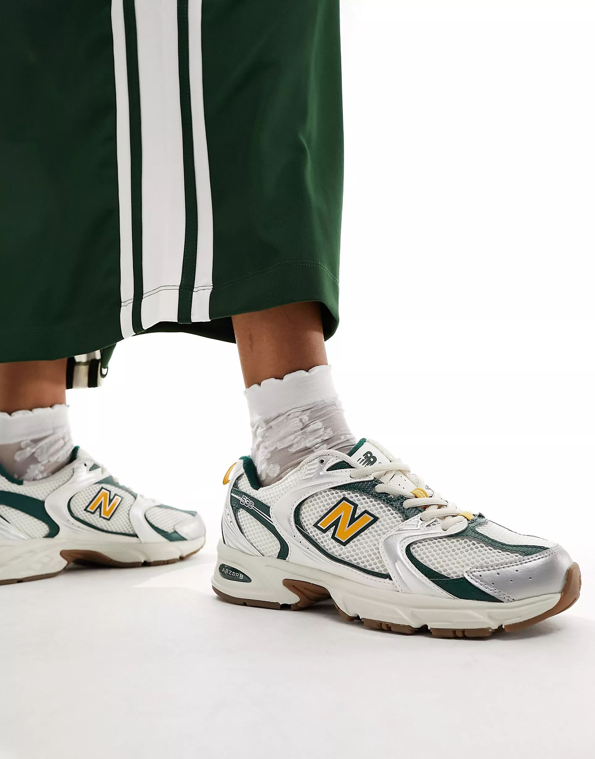 New Balance 530 collegiate sneakers in white green and gold Exclusive at ASOS | ASOS (Global)