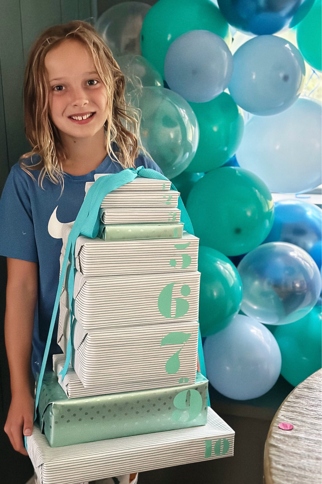 It was so fun wrapping this birthday gift for my niece who was entering double digits. I picked up wrapping paper in my color palette of teal and light blue and then arranged the wrapped gifts from largest to smallest and used my small but mighty Cricut Joy to add the numbers onto the presents. Ten gifts for a 10th birthday party celebration! 

#LTKKids #LTKFamily #LTKParties