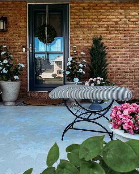 Front porch is ready for summer with faux realistic plants that u can’t kill! Beautiful affordable planter pots, front doormat and the cutest bench makeover with spray paint and outdoor fabric 

#LTKHome #LTKSaleAlert #LTKSeasonal