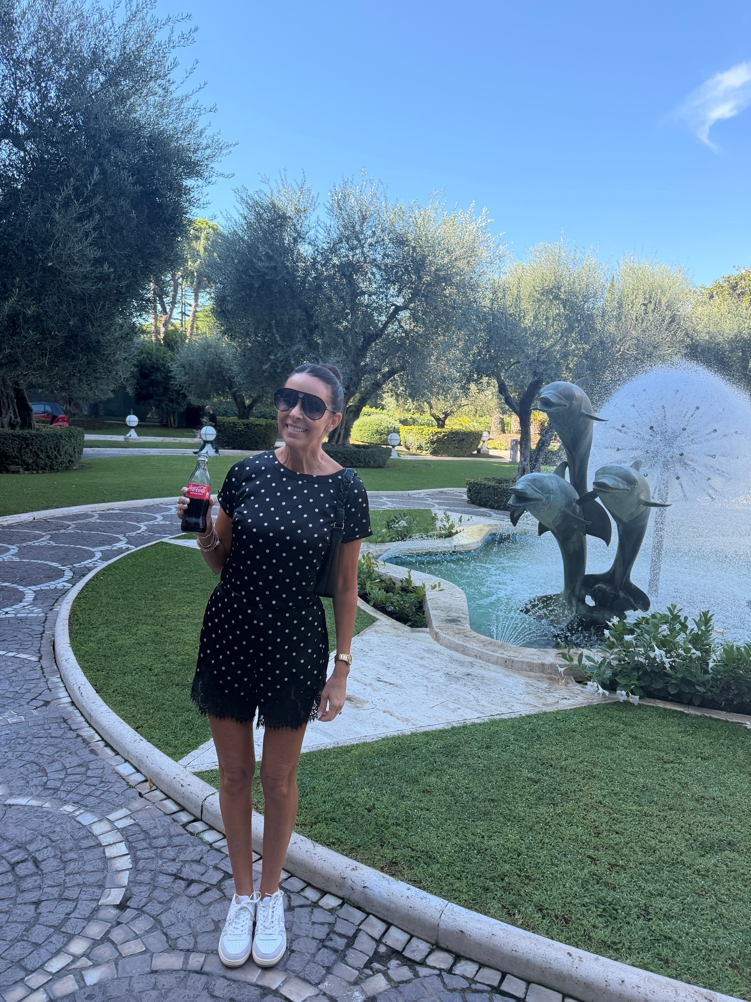 Italy outfit 🇮🇹 This Revolve polka dot shorts set was perfect for a day of exploring—lightweight, comfortable, and easy to wear with sneakers. Such a fun travel outfit!

#LTKootd #LTKdayinmylife #LTKgrwm
