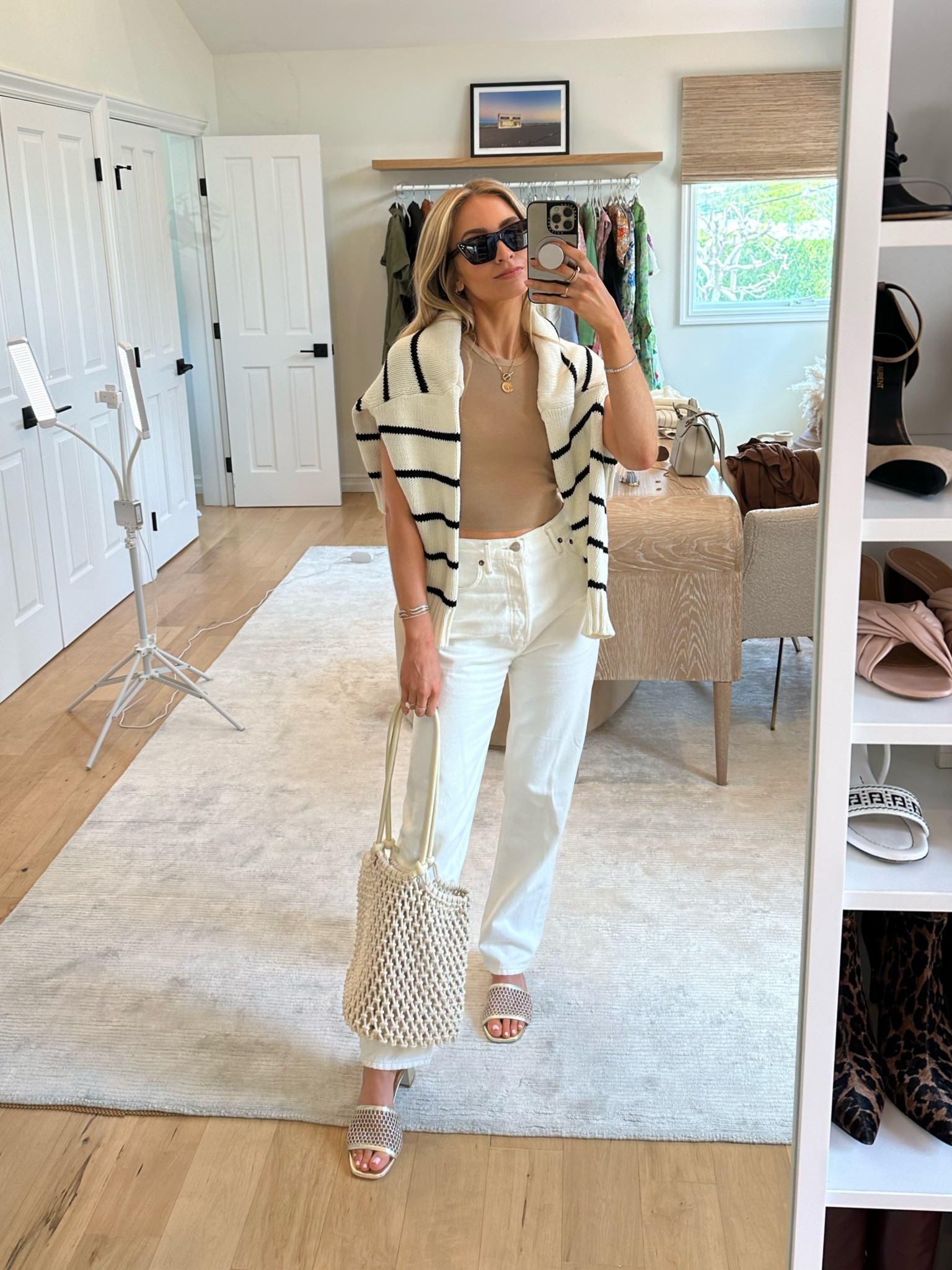Here's what I’d wear in Malibu - a cotton stripe sweater is the best 🌊 Jenni Kayne has 20% off for the summer sale right now 

Styling my gold @stuartweitzman Block Heel Sandals since they're so easily dressed up or down (Sizing - true to size to runs just slightly big - I took my normal size 9, but would have been ok with 8.5 too)

#stuartweitzman #playalife #springstyle

#LTKstyletip #LTKFind 

#LTKSeasonal #LTKSummerSales