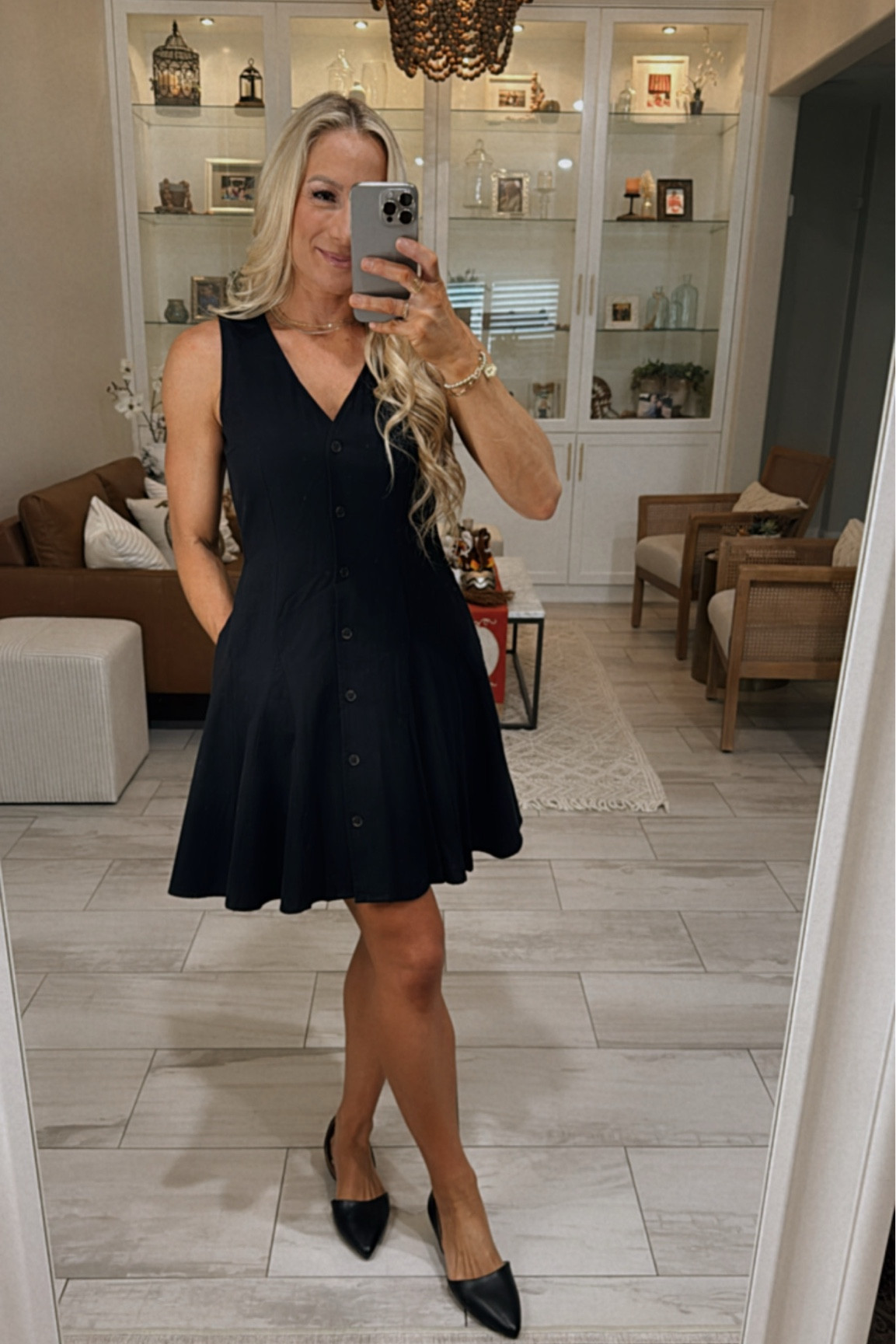 This button front a line dress is so flattering and chic!! Perfect for the holidays, work, dinner, brunch, church, any occasion!

#LTKFindsUnder50 #LTKSaleAlert #LTKStyleTip