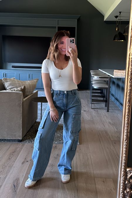 Wearing small in Amazon top (obsessed!! Best find!!), 24 in jeans (tts, I needed a 25 but they didn’t have so they’re pretty tight 🤪), sneakers tts // 

#LTKfindsunder50 #LTKsalealert #LTKstyletip