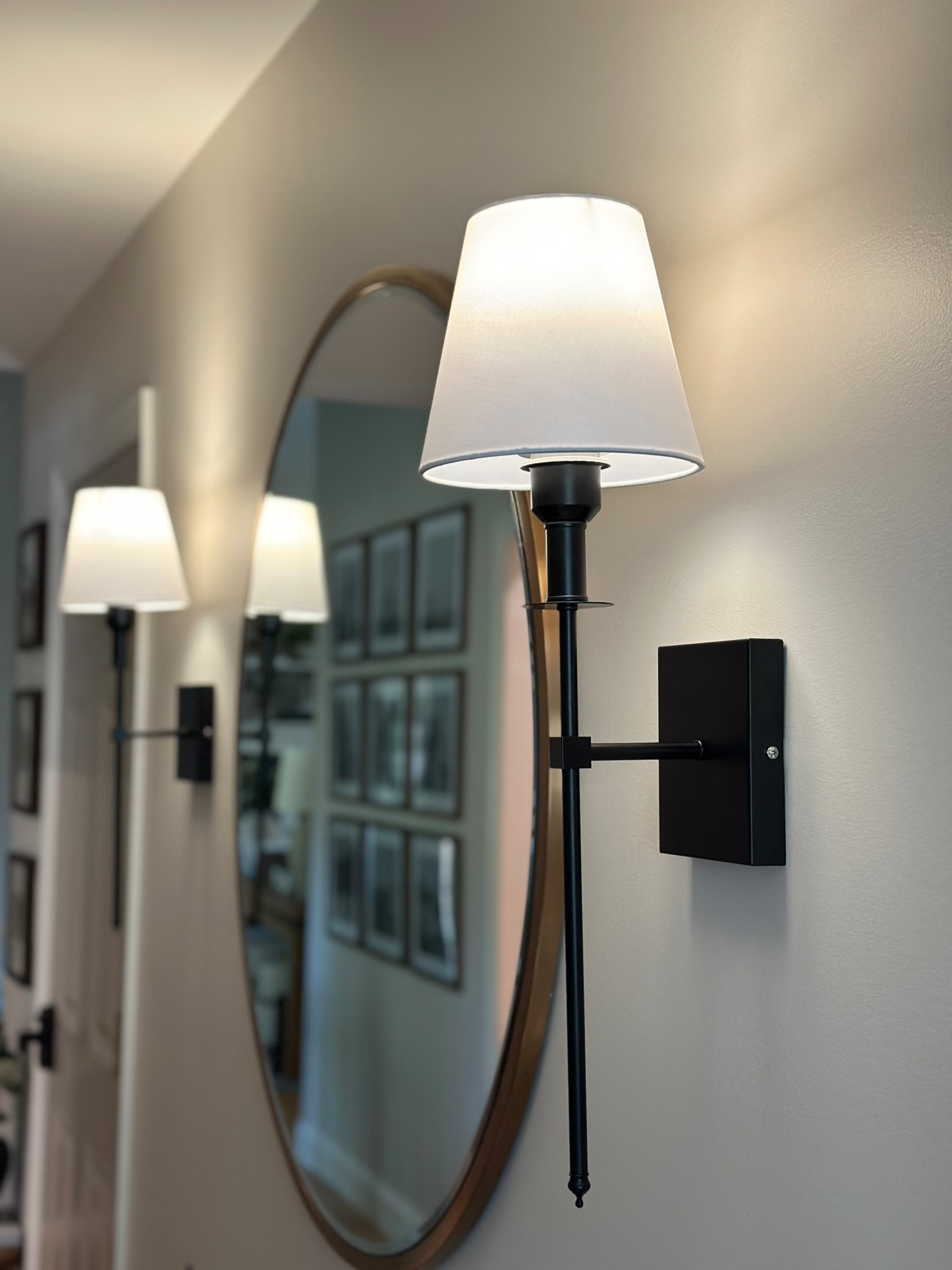Battery operated wall sconces from Amazon under $50 for a set of two. 25in in black but come on gold and silver and a smaller and larger size. These come with the bulbs, remotes and charging cords. Quality is amazing and no hardwiring needed! 



#LTKHome