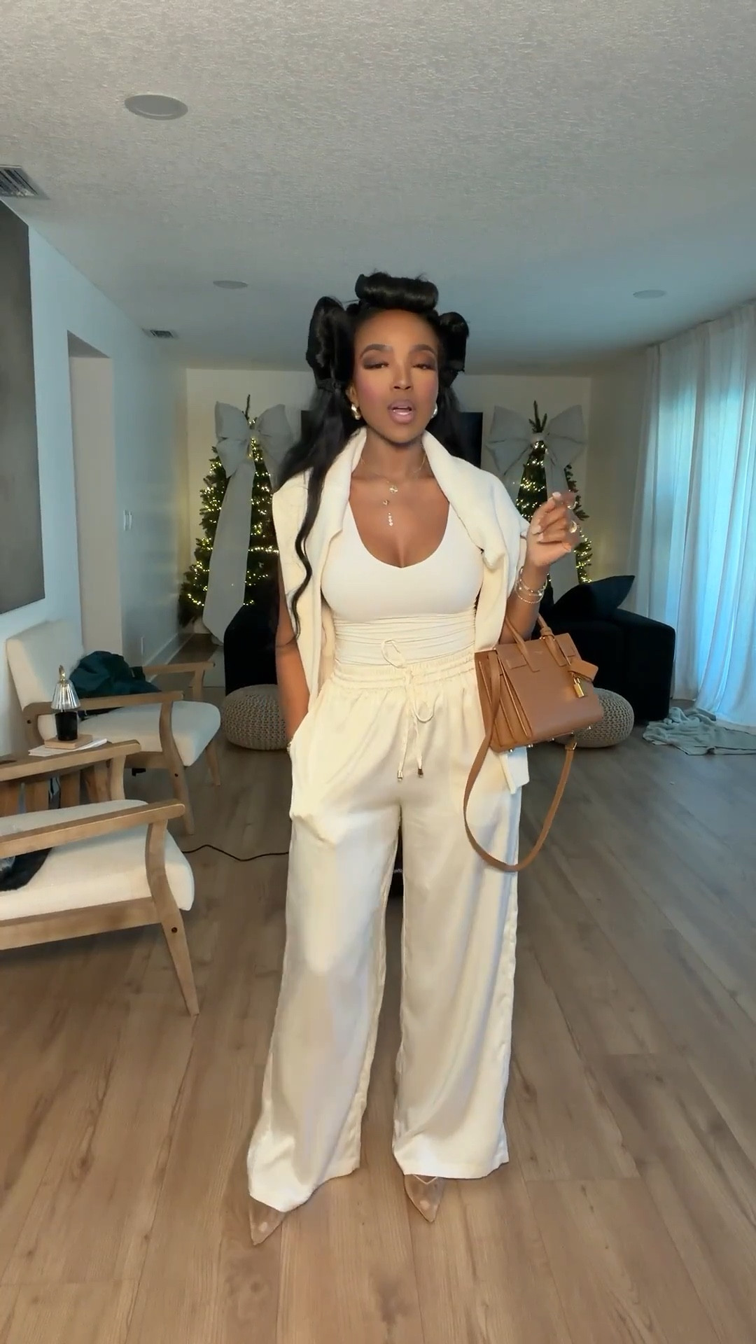 Quiet luxury energy in this creamy monochrome set — the definition of a rich-mom look. The drape, the softness, and the effortless silhouette make this one of those outfits that just *wears well* no matter where you're going.

Tonal pieces like this instantly elevate your day-to-day style and make everything feel more intentional without trying too hard.

Perfect for brunch dates, shopping days, and elevated errands.

📏 Sizing: Top — Small • Pants — Small  
Height 5'4", 138lbs, 34D, 27" waist, 40" hips

Keywords: rich mom aesthetic outfit, quiet luxury style, monochrome neutral look, elevated casual fashion, winter loungewear chic, creamy tone outfit inspo

Follow me on Instagram and YouTube @kirasfashionfinds

#LTKmomlife #LTKootd