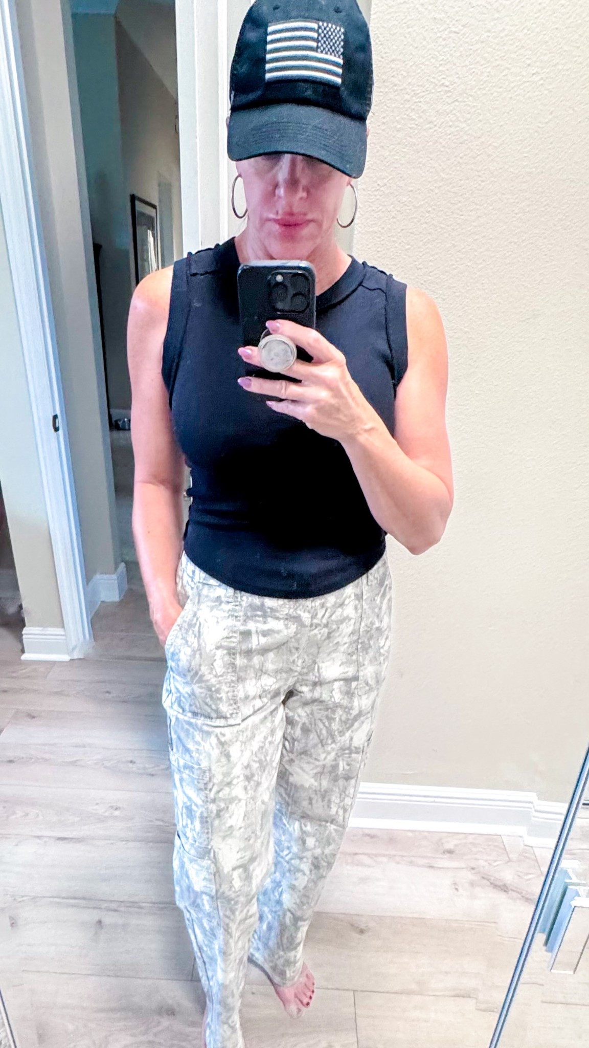 A little throwback, a little trend - camo cargos + a muscle tee never miss. Wearing a medium in top and size S in pants (I’m 5’7 with long legs). #GenXStyle #LTKbudgetfriendly #jennycannon

#LTKFindsUnder50 #LTKOver40 #LTKStyleTip