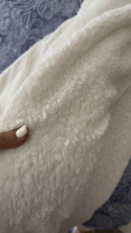Cozy bed blanket from Nordstrom Rack //  This faux shearling fleece blanket is the perfect layer for summer nights and it’s so soft! I have the king size. 

@nordstromrack 
#ad 
#nordstromrack 
#rackyourlook 
#rackyourway  

#LTKSeasonal #LTKFind #LTKhome