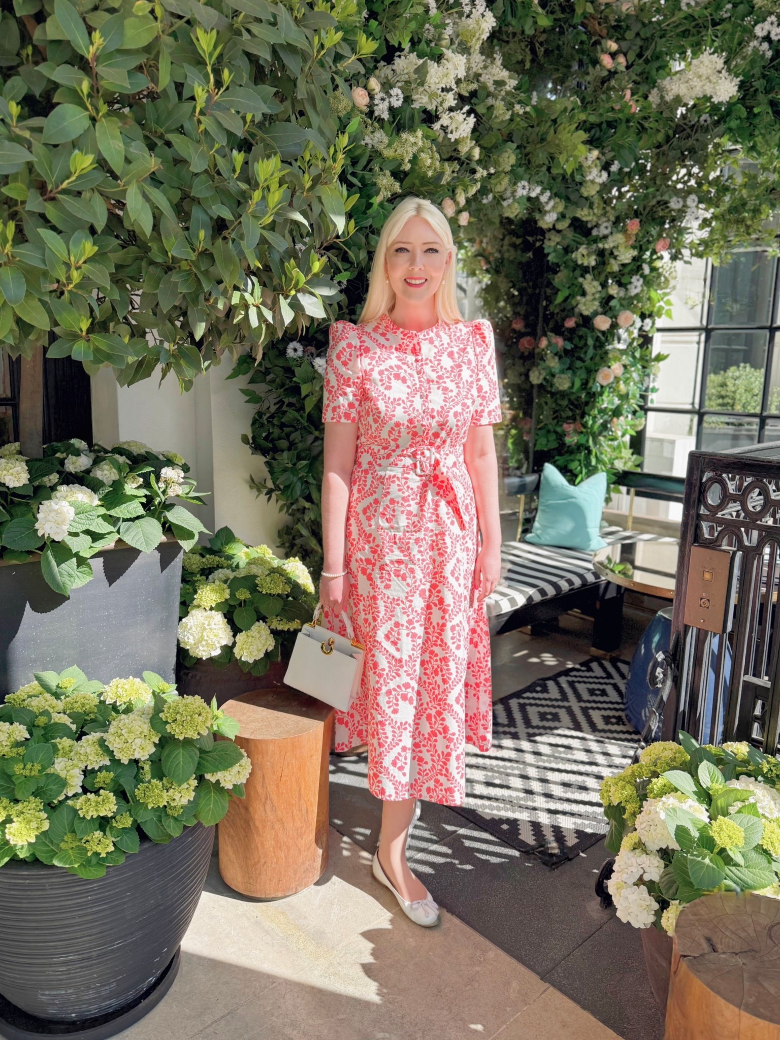 It feels SO good to be in cute printed dresses again - with white accessories!

This is the Kate puff sleeve midi belted dress from Boden which I caught on sale late last summer - but fear not, as they’re the same shape in a different print for SS26

Teamed with Pretty Ballerinas White Patent Rosario and a Coccinelle Mini Binxie Top Handle Bag with Pearls by Dower and Hall, I’ve added plenty of similar accessories  

#LTKdresses #LTKspring #LTKeurope