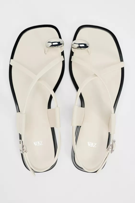 Flat sandals with thin straps and metal ornament at toe. Buckle closure. Sole height: 0.6 inches ... | Zara US