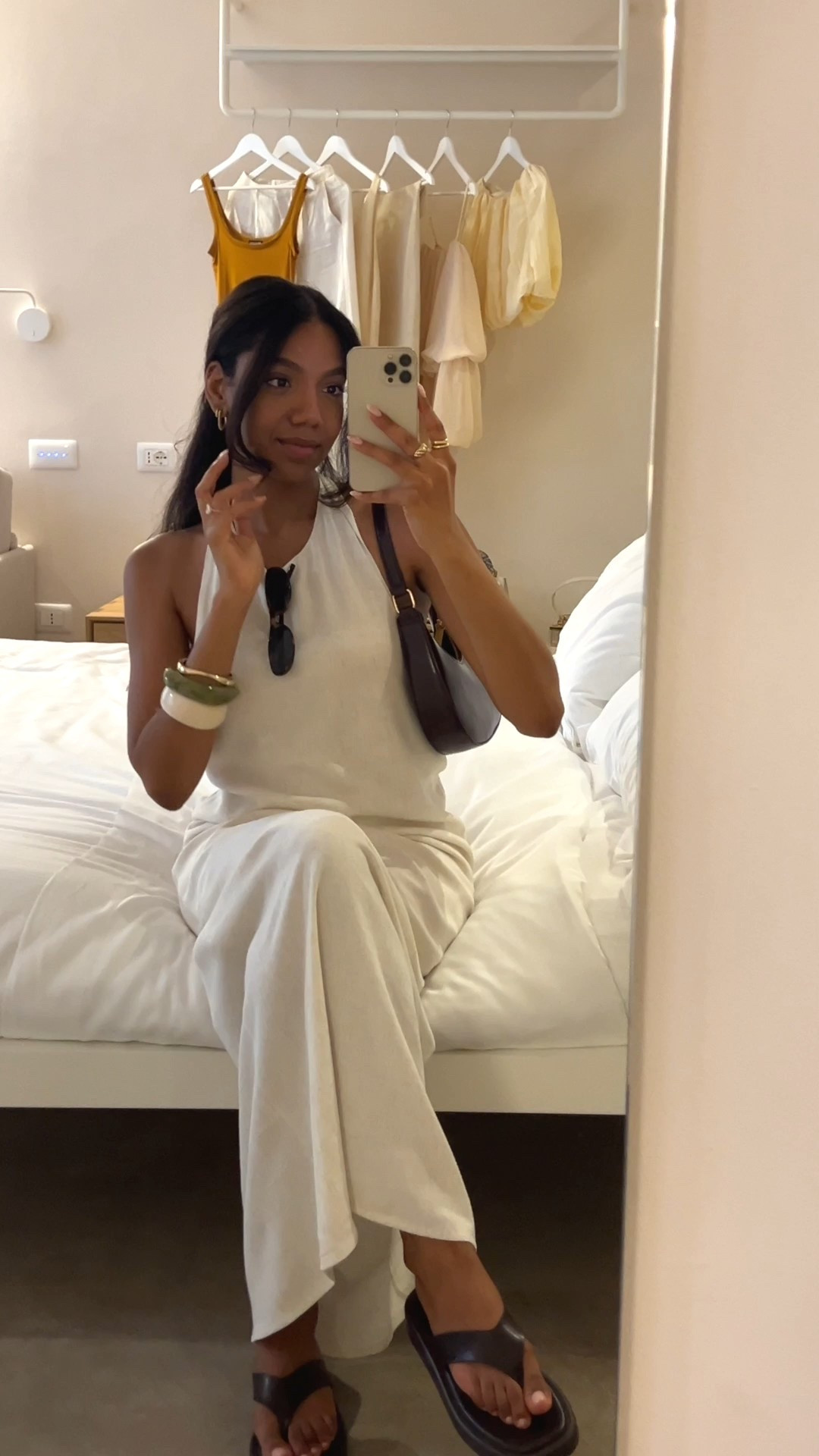 White linen maxi dress | backless maxi dress | euro summer outfit | summer dress | Resin acrylic bracelets  | super slim oval sunglasses | rounded shoulder bag | chunky thong sandal | Italy outfit idea | cinque terre outfit