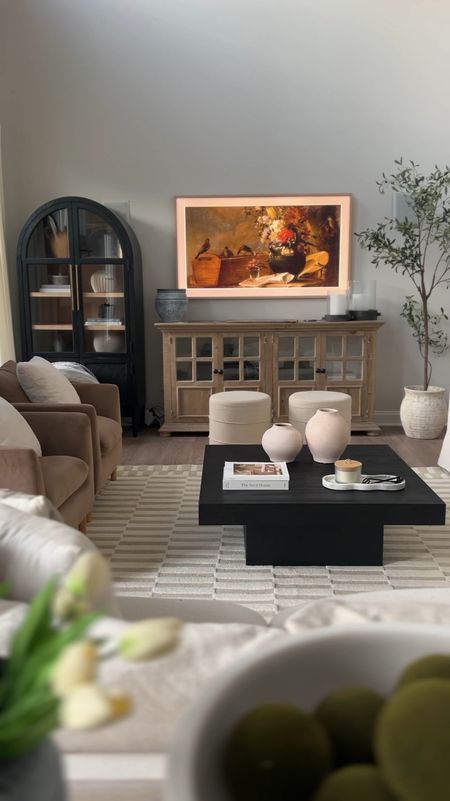 Home decor, neutral home decor, coffee table, Loloi rug, area rug, modern organic, coffee table, cabinet, bookshelf, sofa, chair, olive tree

#LTKVideo #LTKHome #LTKStyleTip