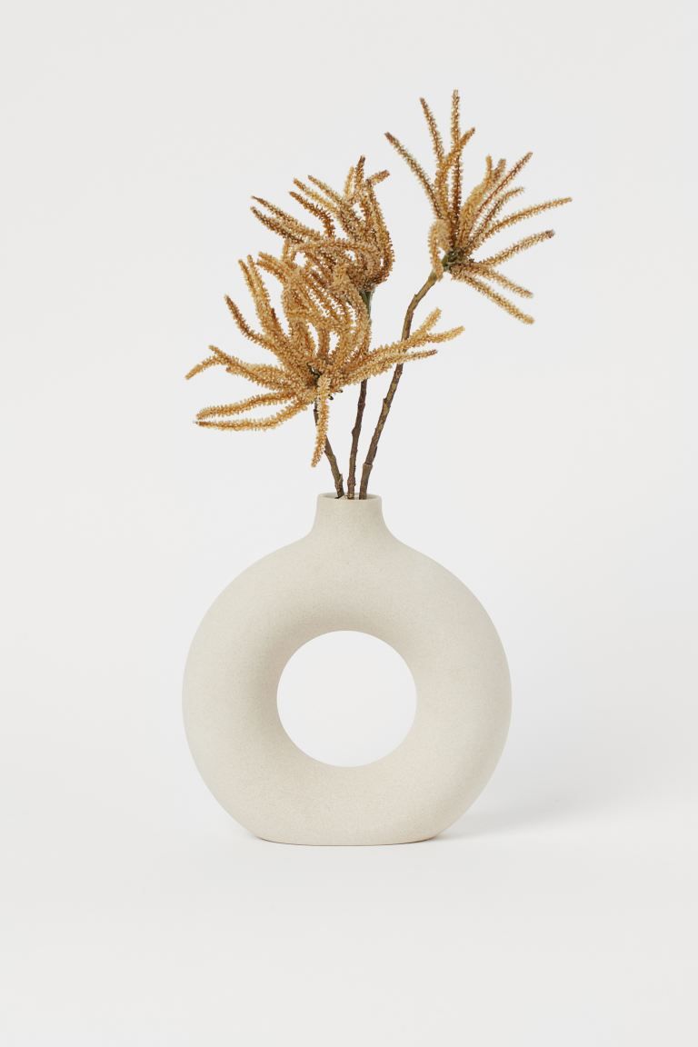 Circular ceramic vase. Diameter 7 3/4 in., total height 8 1/4 in. Diameter of opening approx. 1 1... | H&M (US + CA)