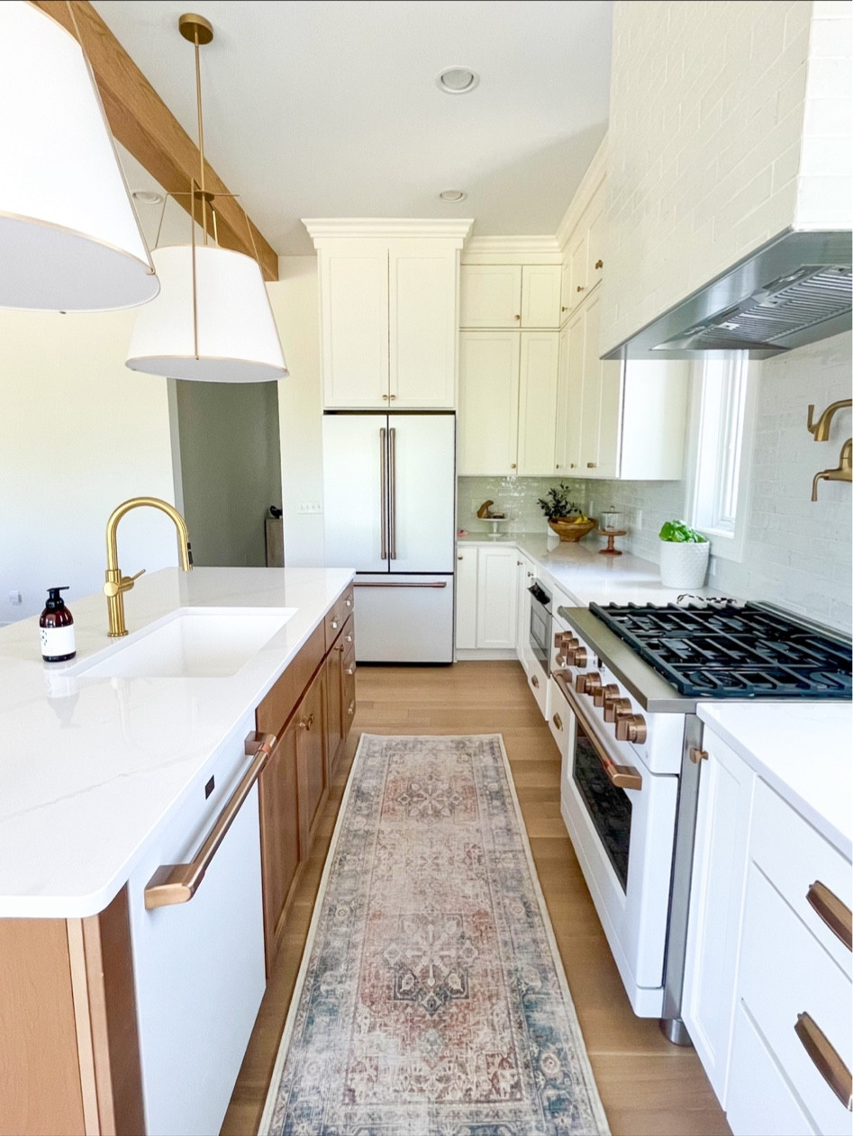 Designing our kitchen was a dream ☁️ 

We love our Cafe Appliances in the Matte White + Brushed Bronze! 

The faucet and pot filler are Kohler in Vibrant Brushed Moderne Brass! 

Don’t be scared to mix golds in your kitchen, it will all come together and reflect your design style! 

#cafeappliances #brushedbronze #kohler #new #kitchen #whitekitchen #interiordesign #kitchendecor #goldhardware 

#LTKSeasonal #LTKhome #LTKFind