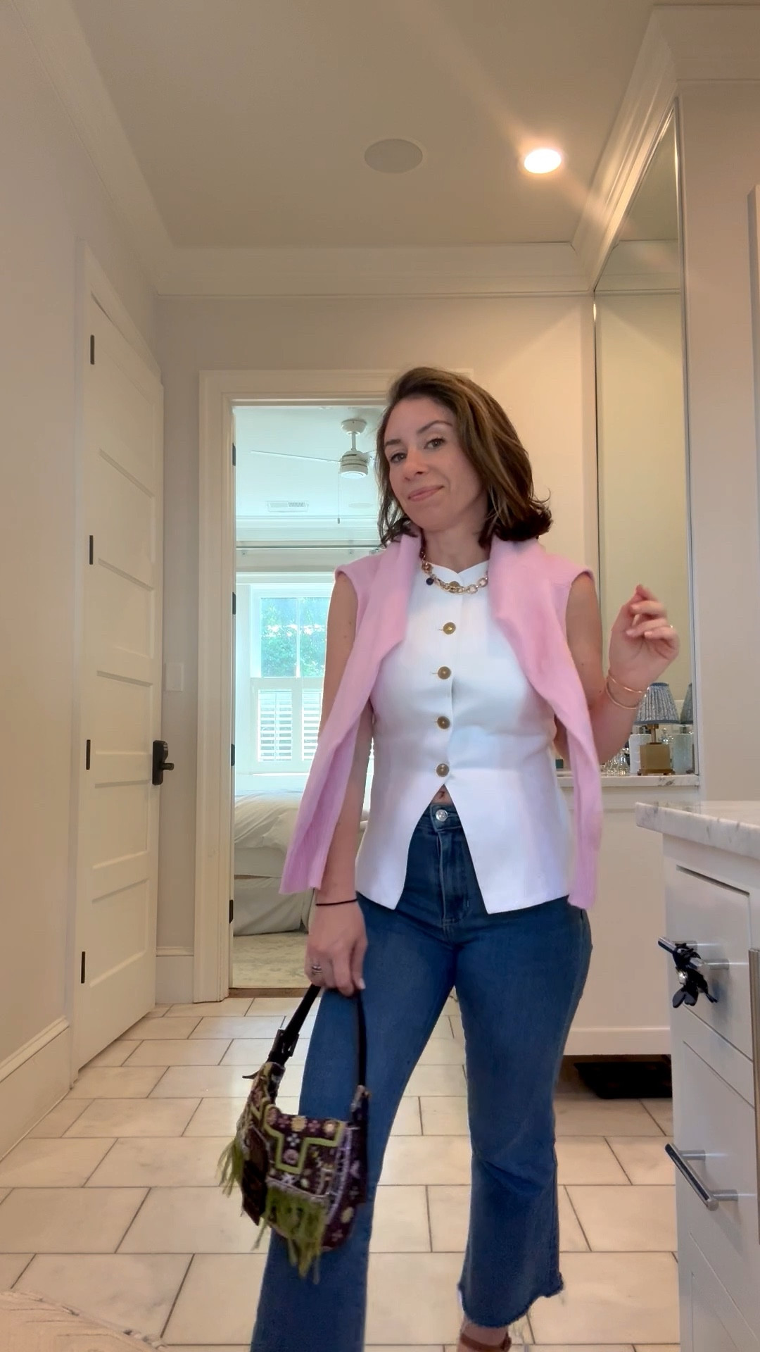 I have worn this vest dozens and dozens of times since buying from Wilfred at Aritzia. This J. crew cashmere sweater is light weight and slightly cropped, so not a lot of fabric pooling around your body which is great, but I would size up by one. 