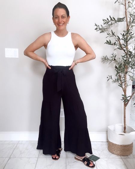 Amazon wide leg pants are a must for spring! Run true to size and I’m in the small. Bodysuit runs true to size as well. Sandals run a tad big.

#LTKover40 #LTKfindsunder50 #LTKstyletip