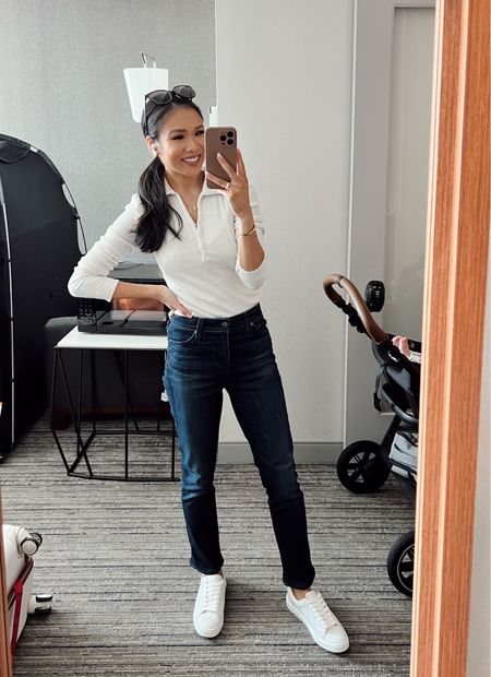 Casual fall outfit with a beige polo sweater, dark wash straight leg jeans, white leather sneakers. Wearing size XS in the sweater. Also linking our favorite travel stroller system and the slumberpod so baby girl can easily sleep  

#LTKfamily #LTKbaby