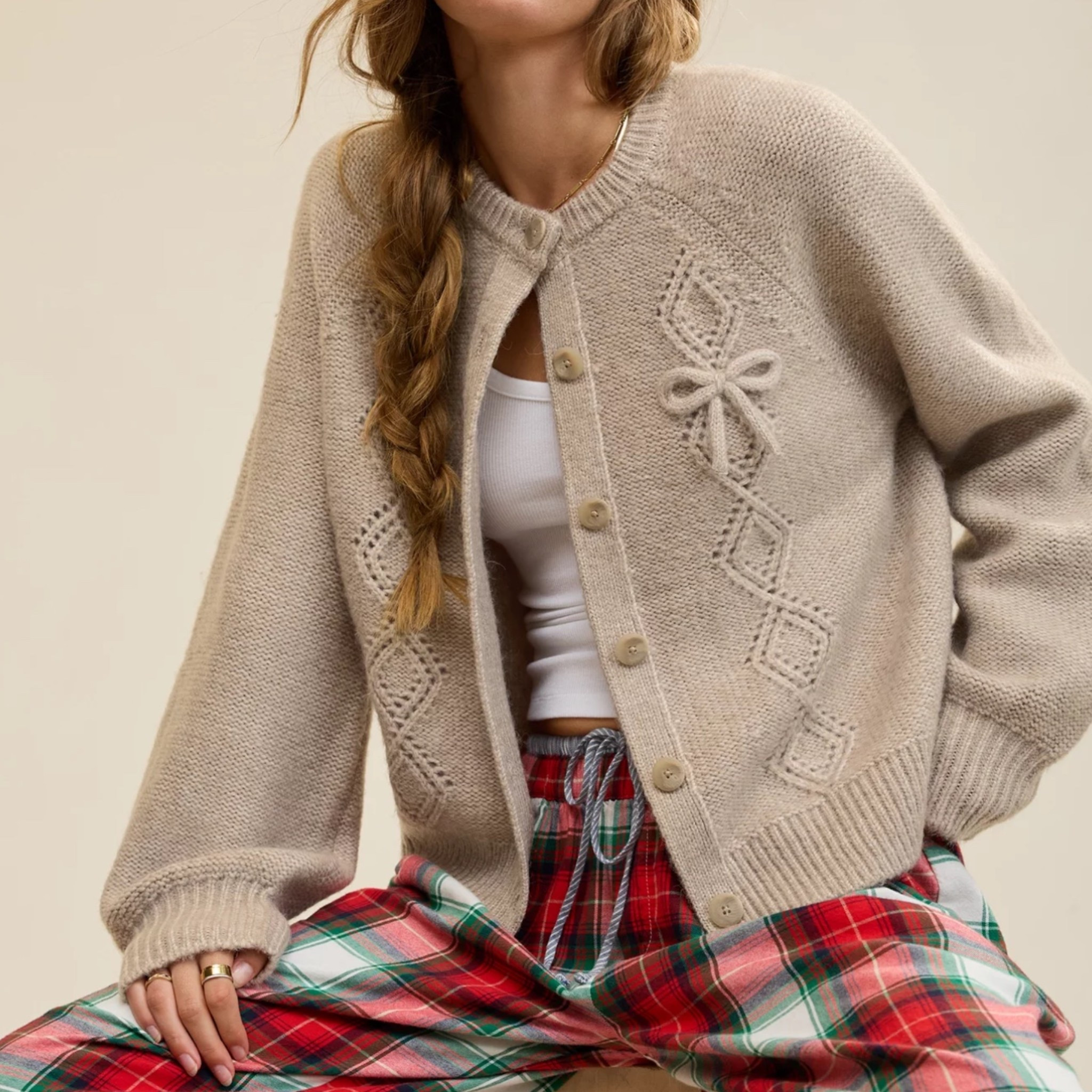 The cardigan of the season 🤍 The AE Classic Cardigan Sweater in Stone Harbor is giving all the cozy, vintage charm we love. With pointelle stitching, ribbed trim, and the sweetest little bow details, it’s the kind of “throw-on-and-feel-cute” piece your closet’s been waiting for. Perfect over a cami or layered with denim for fall strolls and coffee dates ☕🍂

#LTKGiftGuide #LTKootd #LTKHoliday