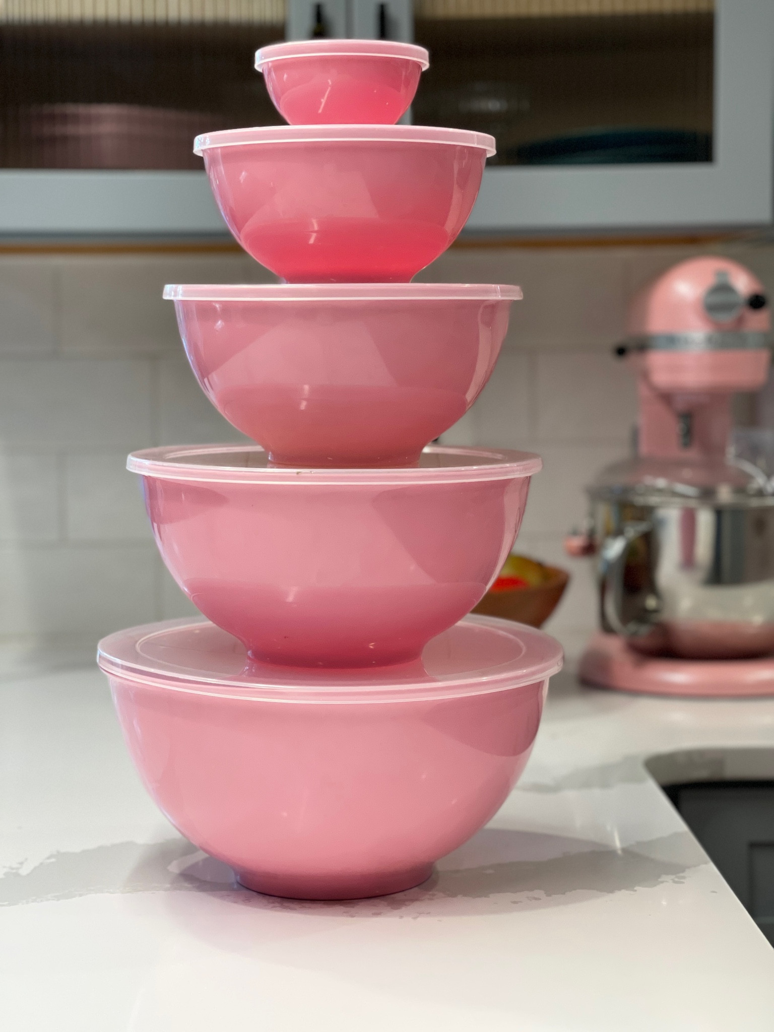Add a little #barbie joy to your kitchen with small splashes of pink! Here are a set of nesting mixing bowls (with lids!) that gives a nod to the Barbie mania without painting all your cabinets pink. But if you want to paint them, go for it. I have a pink kitchen island. #LTKKITCHEN #ltkbarbie 

#LTKhome #LTKunder100