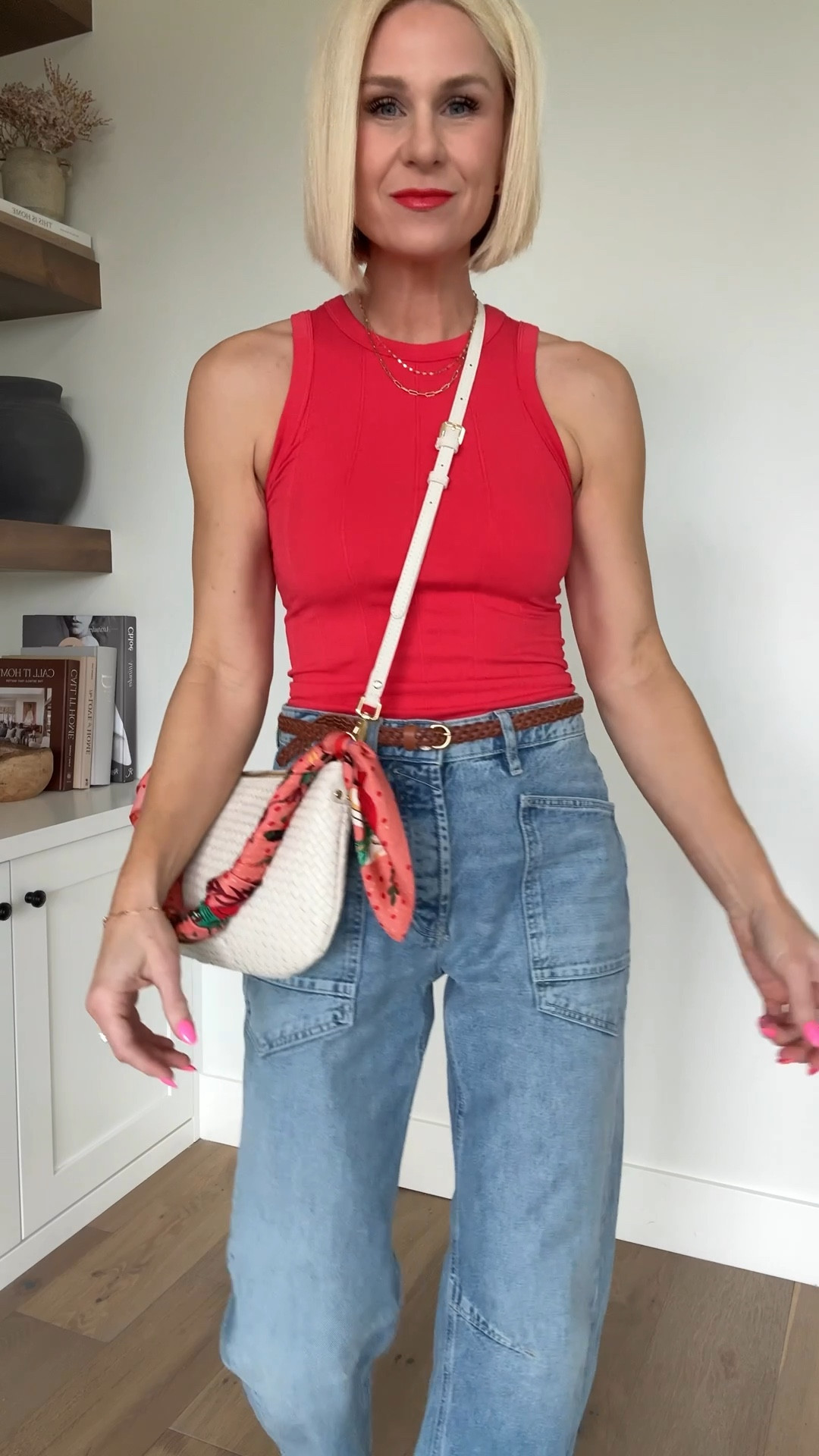 The prettiest red tank + flattering jeans for spring. Silk scarf tied around my most worn woven bag.
Size down in jeans
Wearing a m/L in tank. 

#LTKgrwm #LTKmomlife #LTKMothersDay