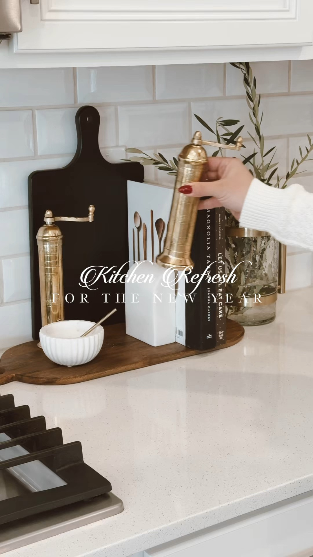 Kitchen Refresh - Kitchen Decor - Kitchen Must Haves - Neutral Kitchen Decor - Black and White Kitchen Decor - Gold Salt and Pepper Mills - Cooking books - wood tray - olive branches - gold book stand - Olive oil dispenser - black cutting board - Kitchen Decor 2025 #kitchendecor

#LTKHome #LTKSeasonal #LTKStyleTip