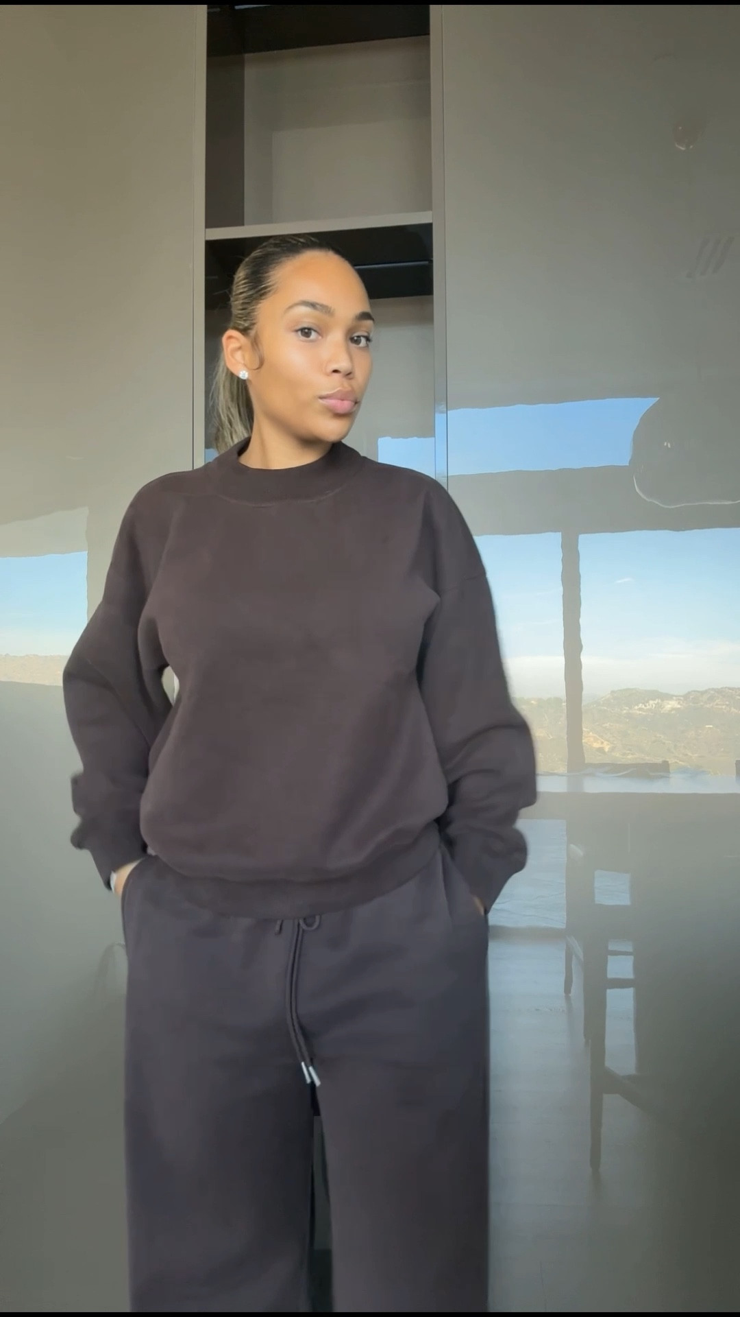 I’m wearing a medium top and large pants.