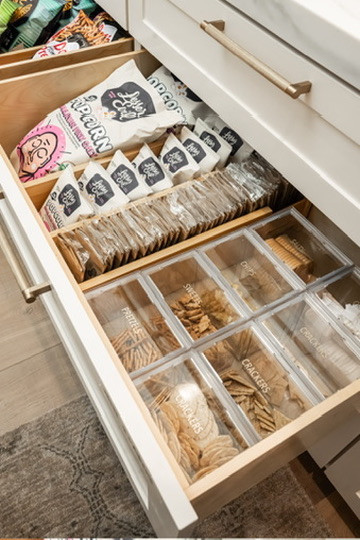 Drawer dividers and airtight canisters are a winning combination!

Is your pantry summer ready?  Admit it, it’s true. The first place your kids are heading when summer arrives is the SNACK ZONE! If your little people are in your pantry day in and day out, asking for food, moving things around, and eating their way through your supplies, a designated snack station may be just what you need to reinstate order and rein in the chaos.

#LTKmomlife #LTKHome #LTKKids