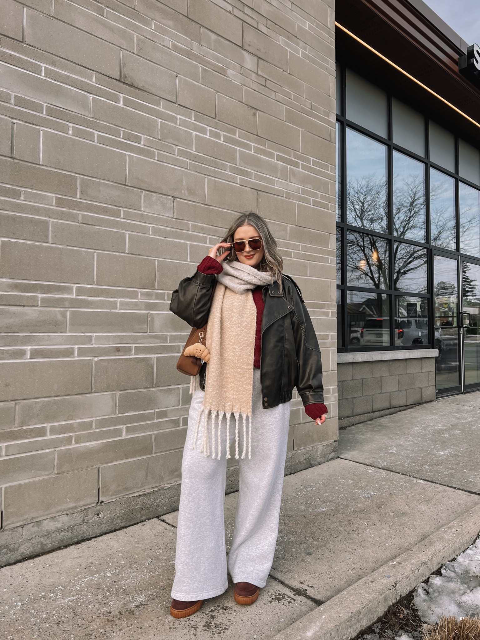 Comfy casual winter outfit! Wearing my usual size L in the wide leg sweatpants, burgundy chenille sweater, white tee, and oversized leather jacket. Sorel snow boots are waterproof and so cozy, consider sizing up if you plan to wear thick socks. Linked similar scarves


#LTKstyletip #LTKmidsize #LTKwinter