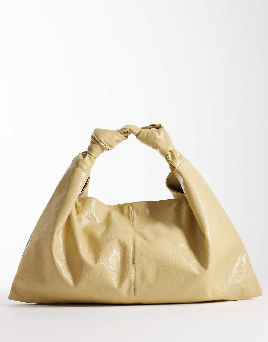 ASOS DESIGN textured slouchy jumbo tote bag in buttermilk-Yellow | ASOS (Global)