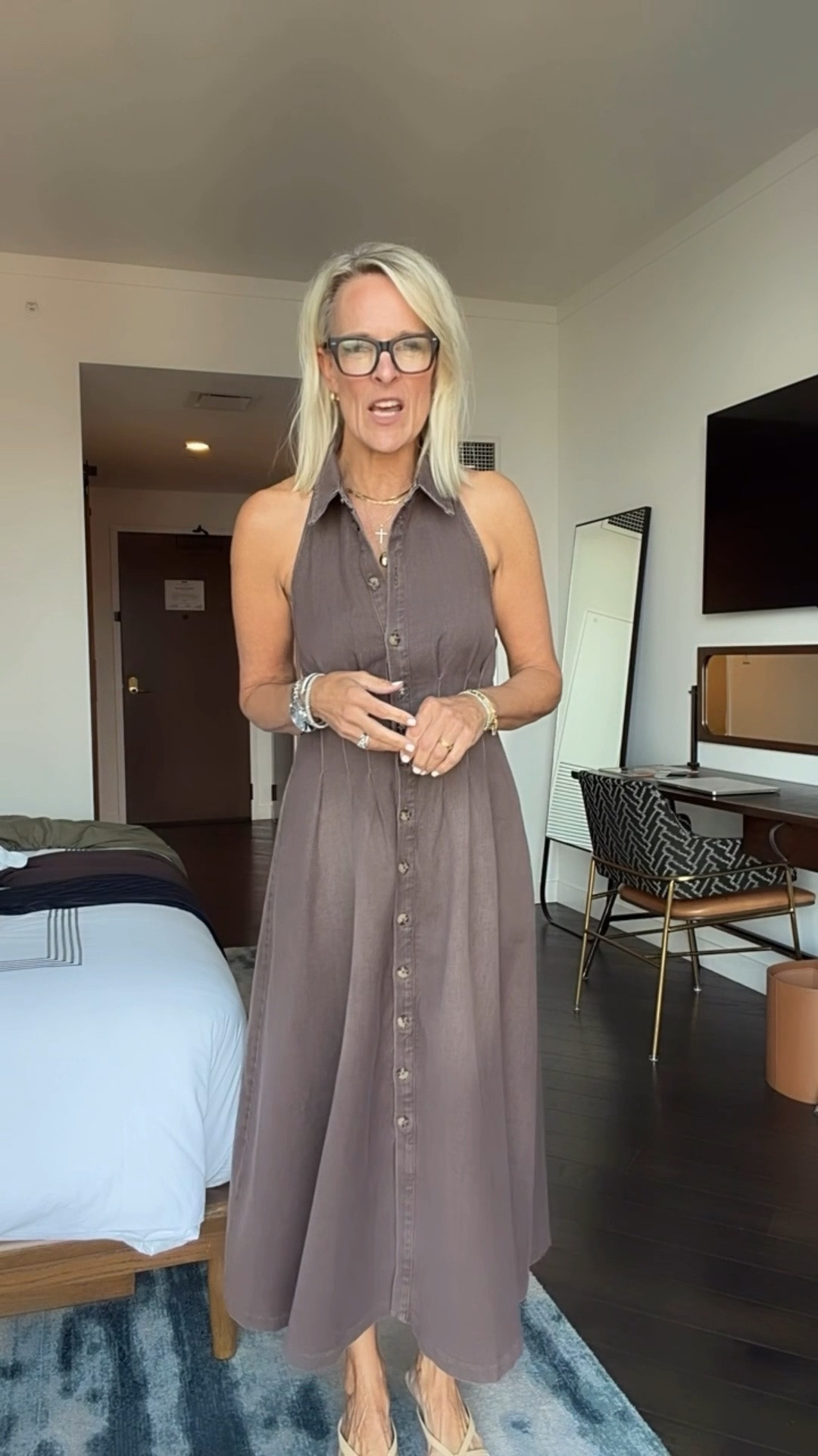 Trying to decide which outfit to wear out to a dinner in Nashville with my team 

This brown halter dress is 30% off currently and is a full new arrival!! 
Wearing small in brown
Medium in green dress ￼

@Anthropologie ￼

#LTKootd #LTKSaleAlert #LTKOver40