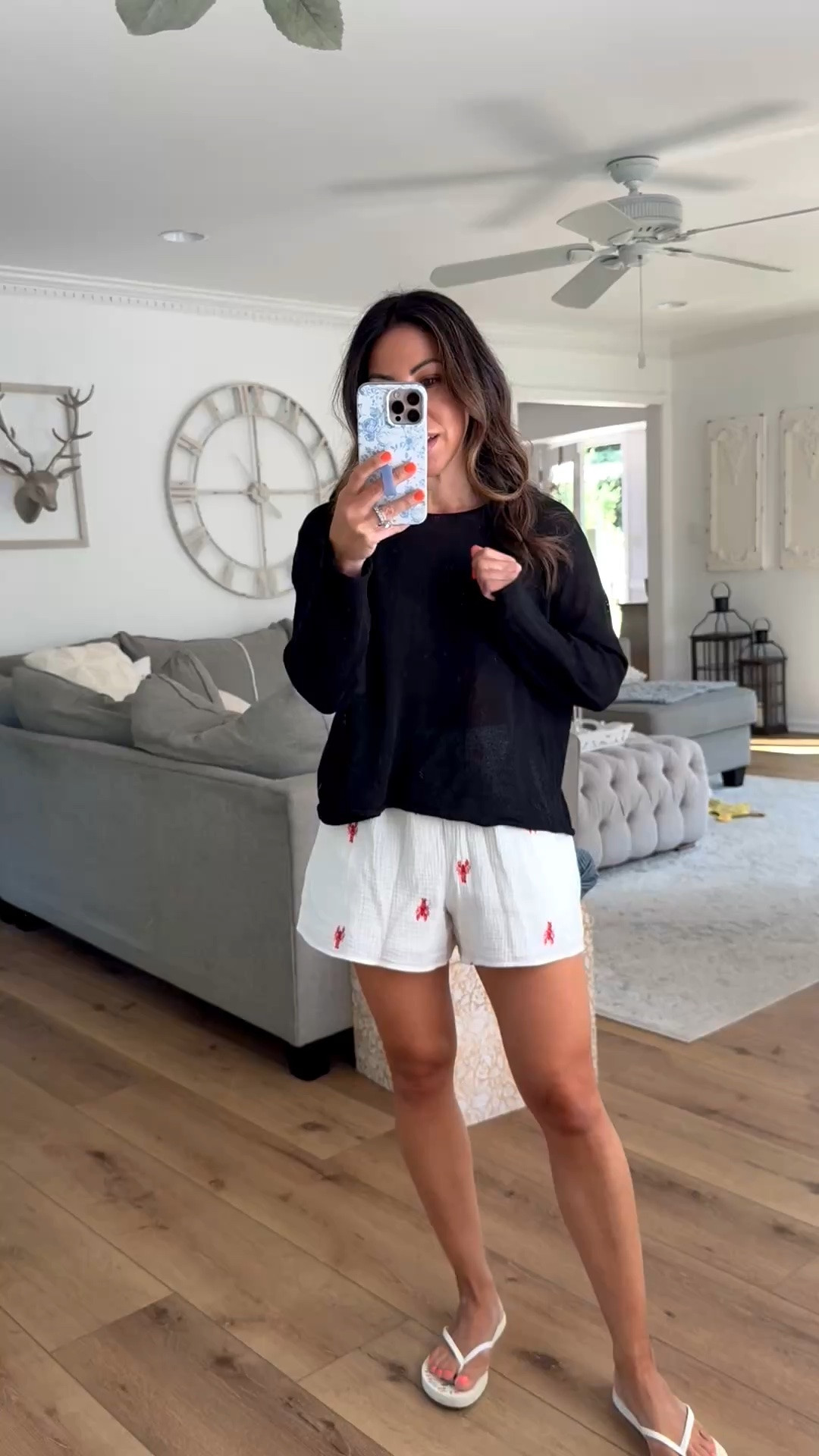 Code FAVS50 for 50% off at Social Threads. 
Small black sweater. Small gauze shorts.

#LTKSaleAlert #LTKOver40