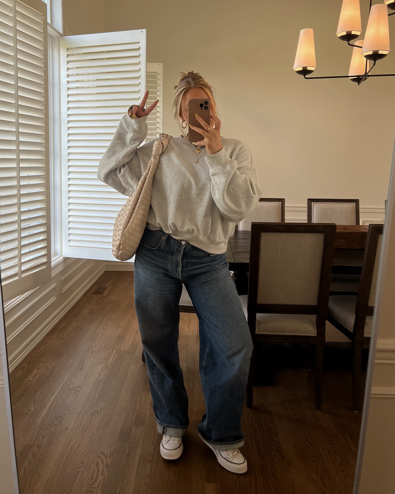 Target sweatshirt is adorable love the slight cinch at the waistband!! I went up to a large. Jeans size down 2 sizes they run very baggy. Fave Anthropologie bag that comes in multiple colors and sizes. Size down 1/2 in converse platform sneakers 

#LTKShoeCrush #LTKFindsUnder50 #LTKSeasonal